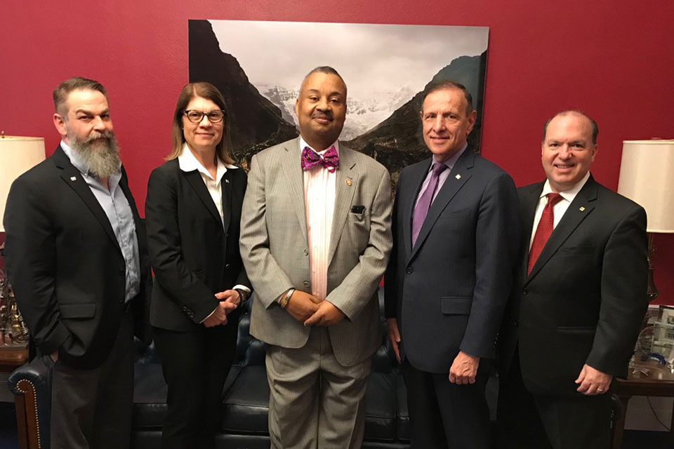 
7. L-R: PIANJ past President William R. Vowteras, CPIA; PIANJ Secretary Connie Mahoney: Rep. Donald Payne Jr., D-10; PIANJ past President Paul Monacelli, CIC, CPIA; and PIA National President and PIANJ past President Keith A. Savino, CPIA. 